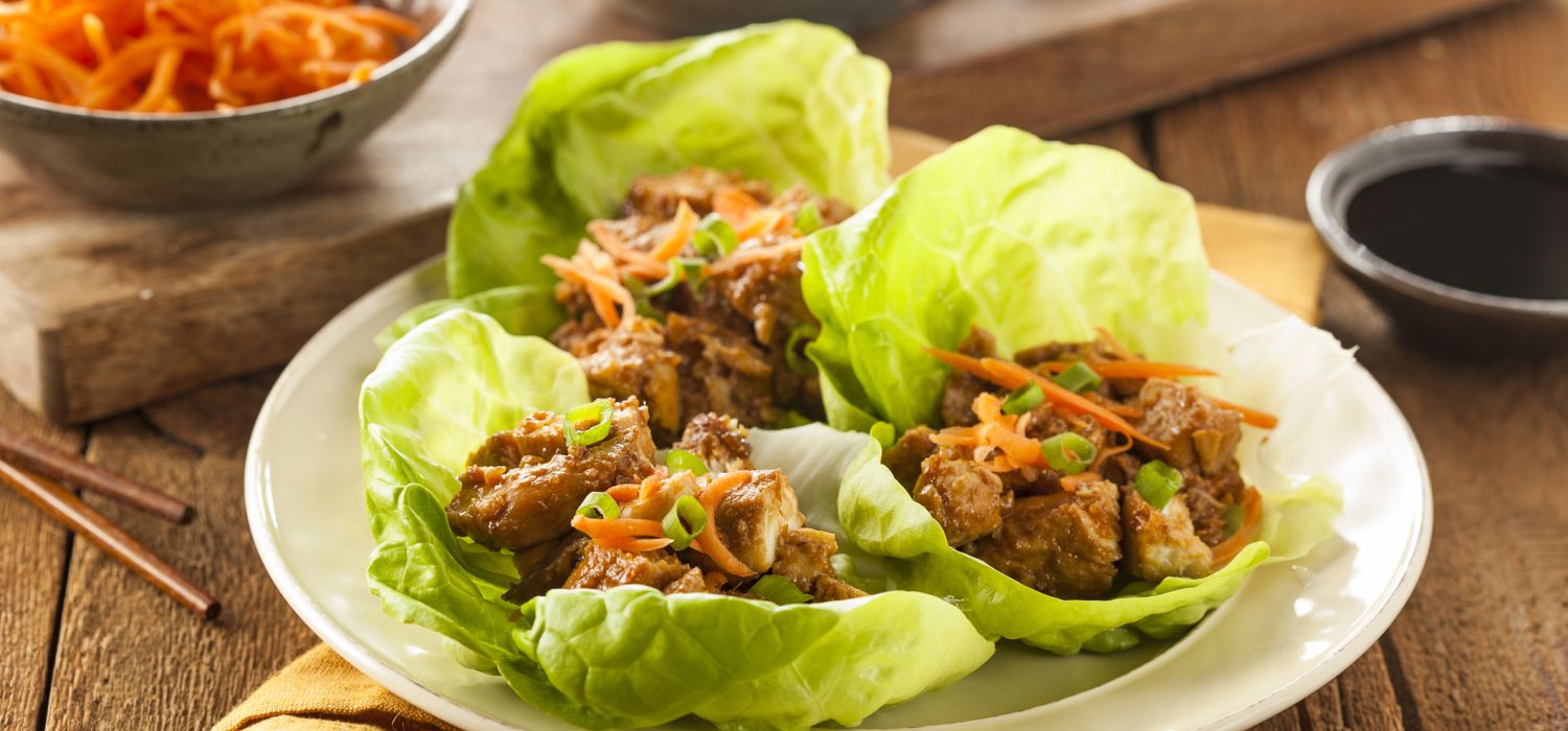 meat wrapped in cabbage on plate